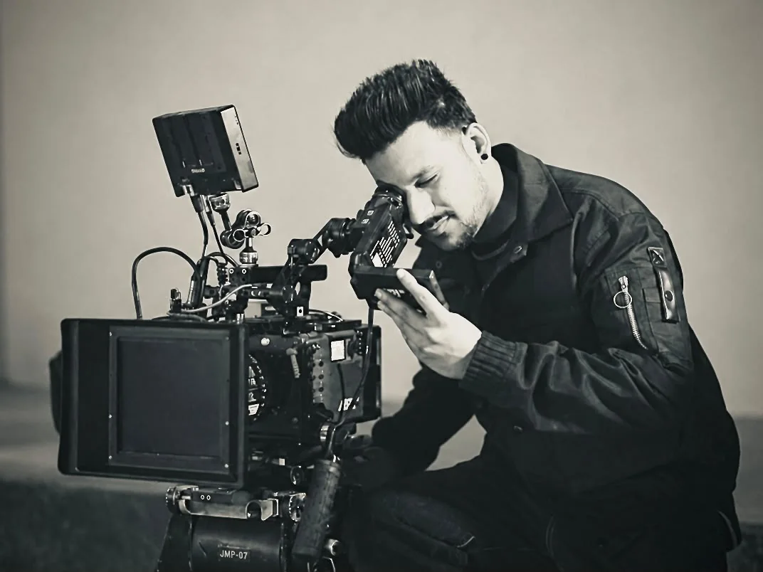 Checking the frame through the camera's eyepiece