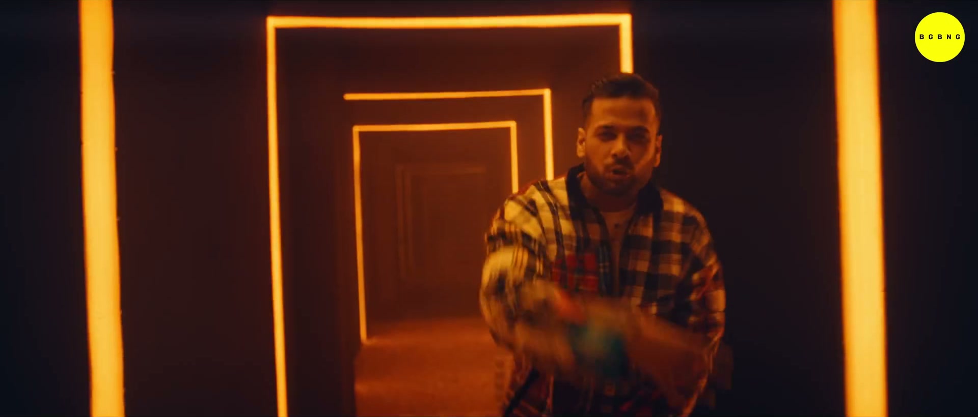 Rapper inside the orange neon tunnel