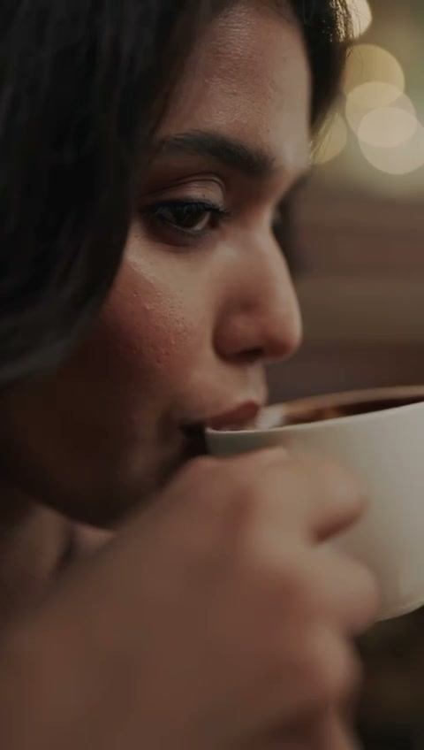 Close-up sipping coffee
