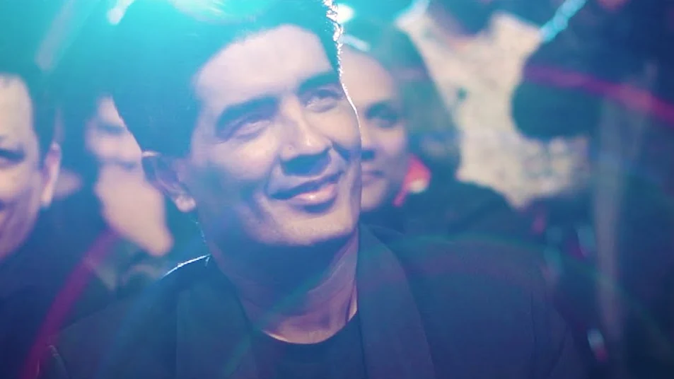 A guest in the crowd, blue light